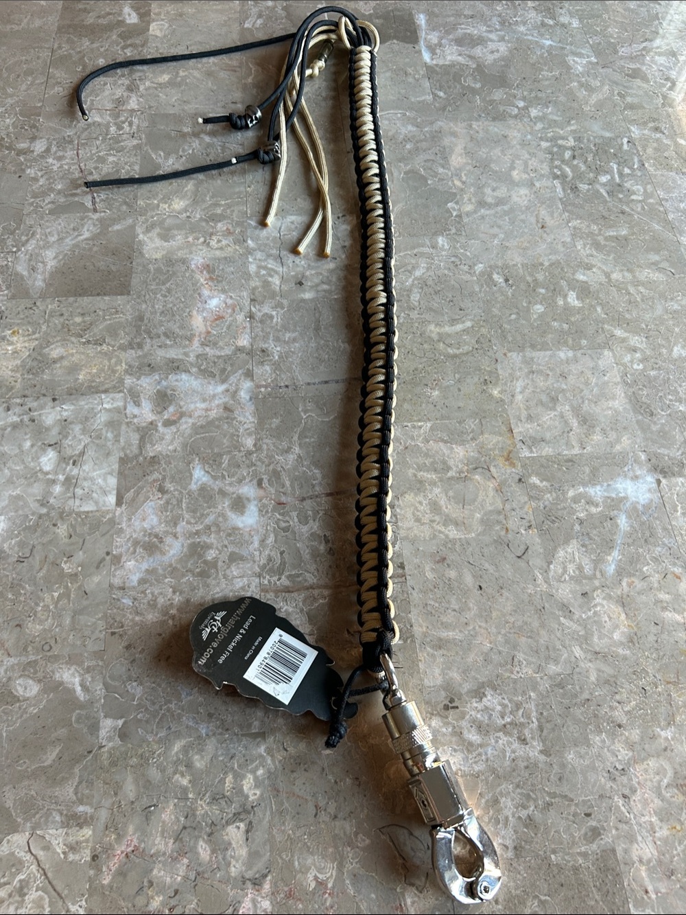 Braided Black and Tan Leather Motorcycle Accessory with Metal Clip